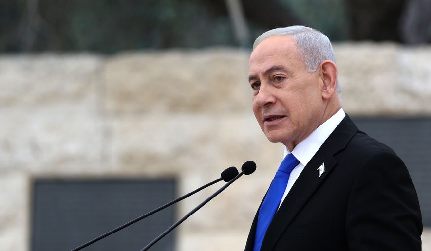 Israel's Prime Minister Benjamin Netanyahu attends a ceremony at the Military Cemetery on Mount Herzl in Jerusalem, April 21, 2026. (Ilia Yefimovich/Pool Photo via AP, File)