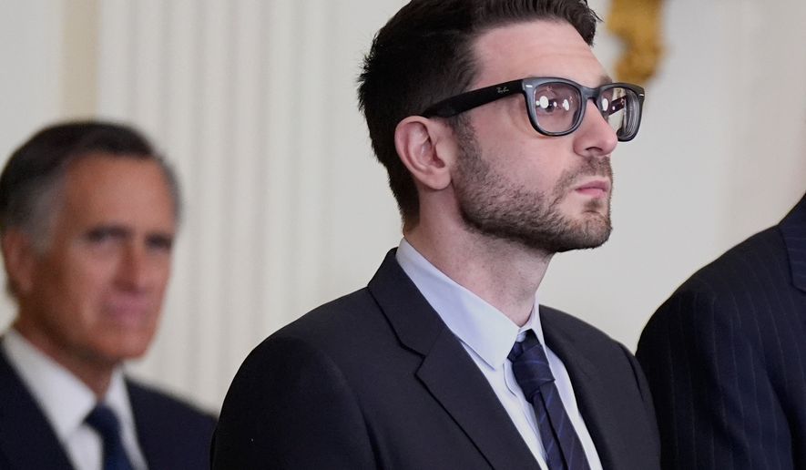 FILE - Alex Soros, on behalf of his father George Soros, stands in the East Room of the White House, Jan. 4, 2025, in Washington. (AP Photo/Manuel Balce Ceneta, File)