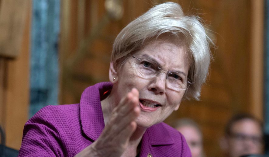 Sen. Elizabeth Warren, D-Mass., questions Health and Human Services Secretary Robert F. Kennedy Jr. as he testifies before a Senate Committee on Finance hearing on Capitol Hill, Wednesday, April 22, 2026, in Washington. (AP Photo/Jose Luis Magana)