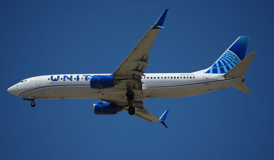 United Airlines jetliner prepares to land on a runway at Denver International Airport Monday, May 11, 2026, in Denver. (AP Photo/David Zalubowski, File)