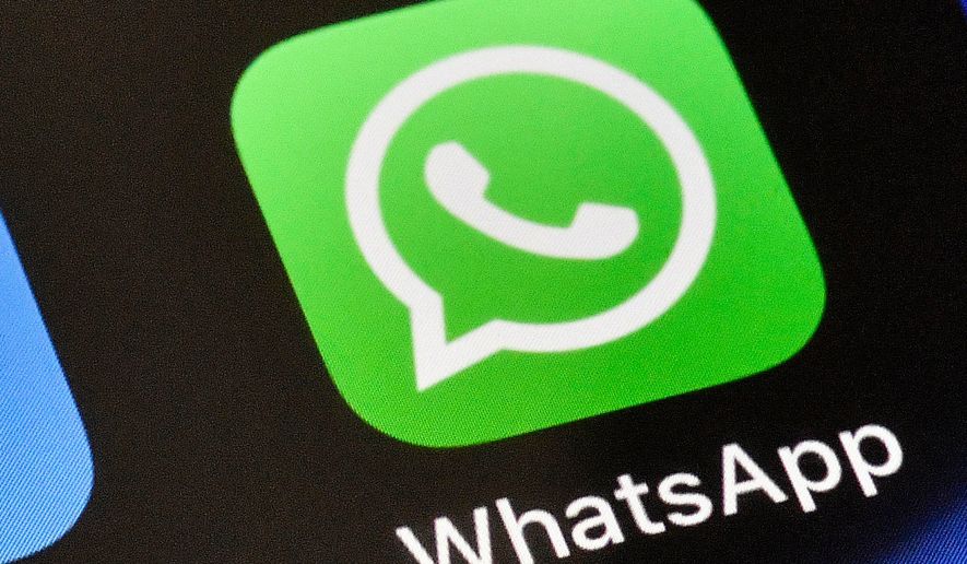 FILE - A WhatsApp icon is displayed on an iPhone, Nov. 15, 2018, in Gelsenkirchen, Germany. (AP Photo/Martin Meissner, File)