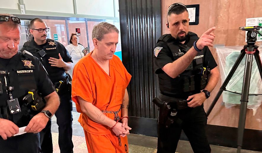 Oklahoma County Sheriff's deputies lead longtime death row inmate Richard Glossip to a courtroom on June 9, 2025, at the Oklahoma County Courthouse in Oklahoma City. (AP Photo/Sean Murphy, File)