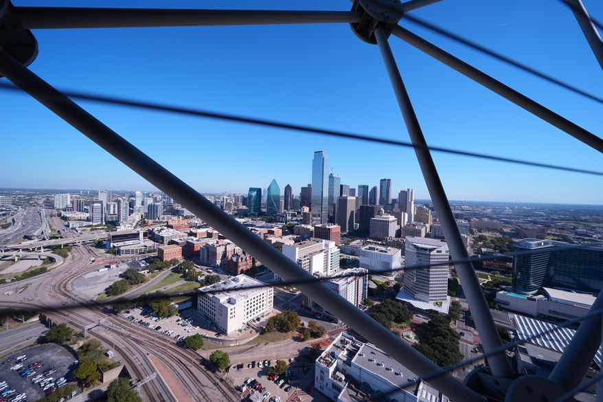 FILE - The Dallas skyline is visible through the framing of Reunion Tower, Nov. 6, 2025, in Dallas. (AP Photo/Julio Cortez, File)