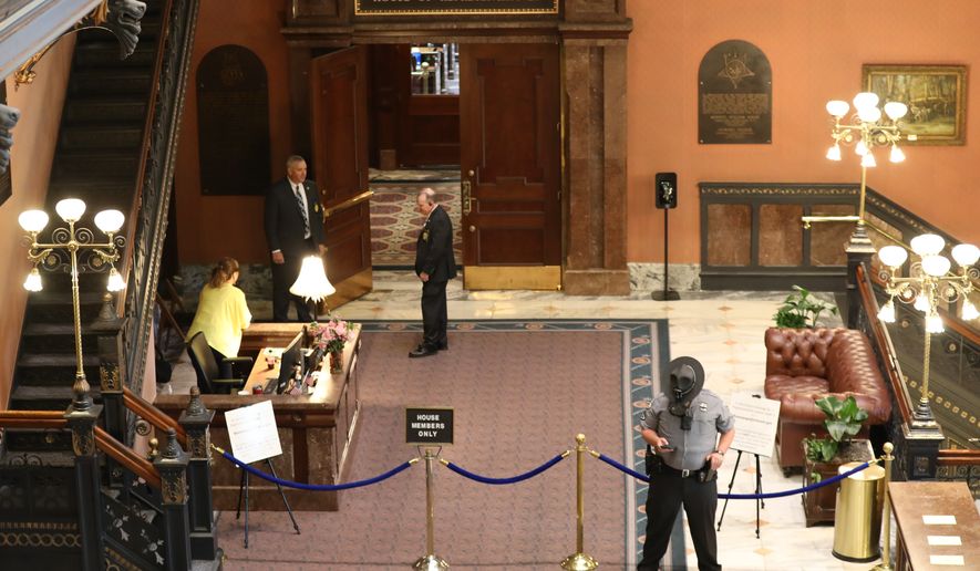 The South Carolina House chamber is roped off as authorities put in extra security during debate on a redistricting bill on Friday, May 15, 2026, in Columbia, S.C. (AP Photo/Jeffrey Collins).