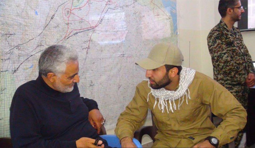 This photo from a criminal complaint unsealed Friday, May 15, 2026 by the U.S. District Court for the Southern District of New York, shows Mohammad Baqer Saad Dawood Al-Saadi, right, with Qasem Soleimani, former commander of the Iran's Islamic Revolutionary Guard Corps' Quds Force, featured on al-Saadi’s Snapchat account according to a federal criminal complaint. (U.S. District Court for the Southern District of New York via AP)