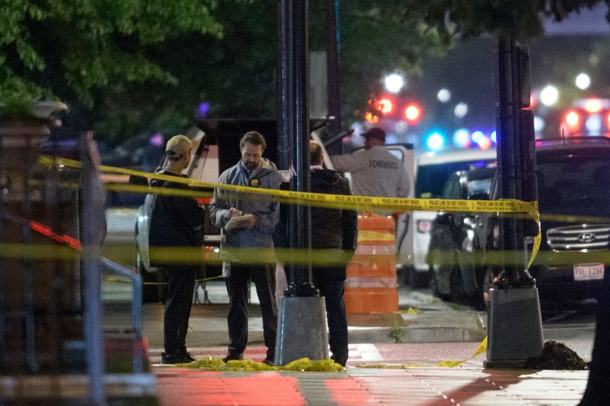 Law enforcement work the scene after two staff members of the Israeli Embassy in Washington were shot and killed outside the Capital Jewish Museum, May 22, 2025, in Washington. (AP Photo/Rod Lamkey, Jr., File)