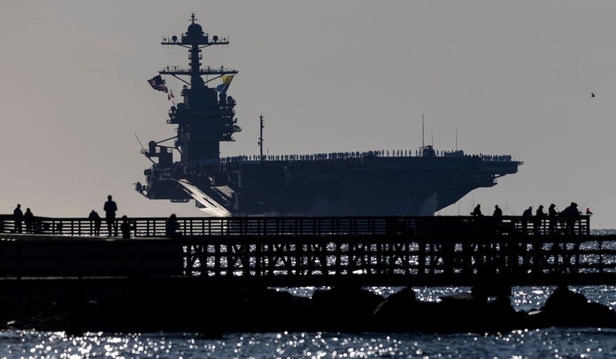 The USS Gerald R. Ford heads toward port at Naval Station Norfolk, as seen from Fort Monroe, Va., on May 16, 2026. (Peter Casey/The Virginian-Pilot via AP)