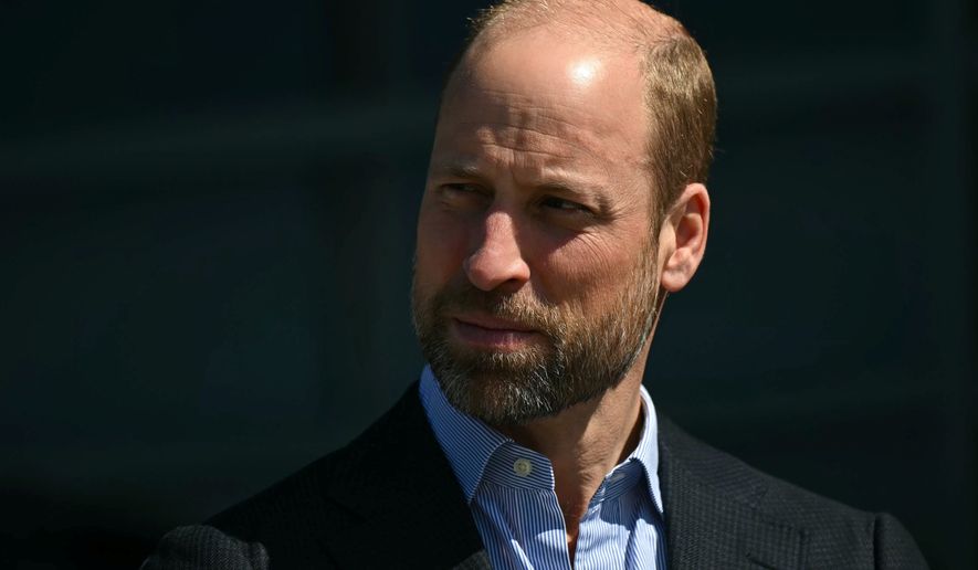 FILE - Britain's Prince William pays a visit to the headquarters of British Formula E team, Jaguar TCS Racing, at Kidlington, England, Thursday April 23, 2026. (Justin Tallis, Pool Photo via AP, file)
