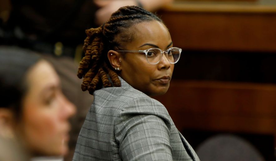 Former Richneck Elementary School Assistant Principal Ebony Parker looks back into the courtroom during Abby Zwerner's lawsuit against her on Oct. 28, 2025, in Newport News, Va. (Stephen M. Katz/The Virginian-Pilot via AP, Pool, File)