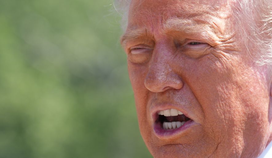 President Donald Trump speaks as he tours Ballroom construction around the outside the White House, Tuesday, May 19, 2026, in Washington. (AP Photo/Jacquelyn Martin)
