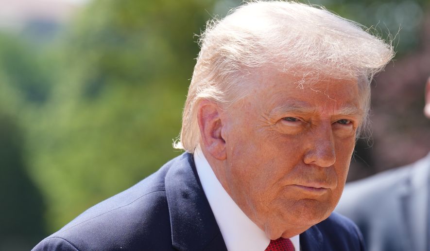 President Donald Trump tours Ballroom construction around the outside the White House, Tuesday, May 19, 2026, in Washington. (AP Photo/Jacquelyn Martin)