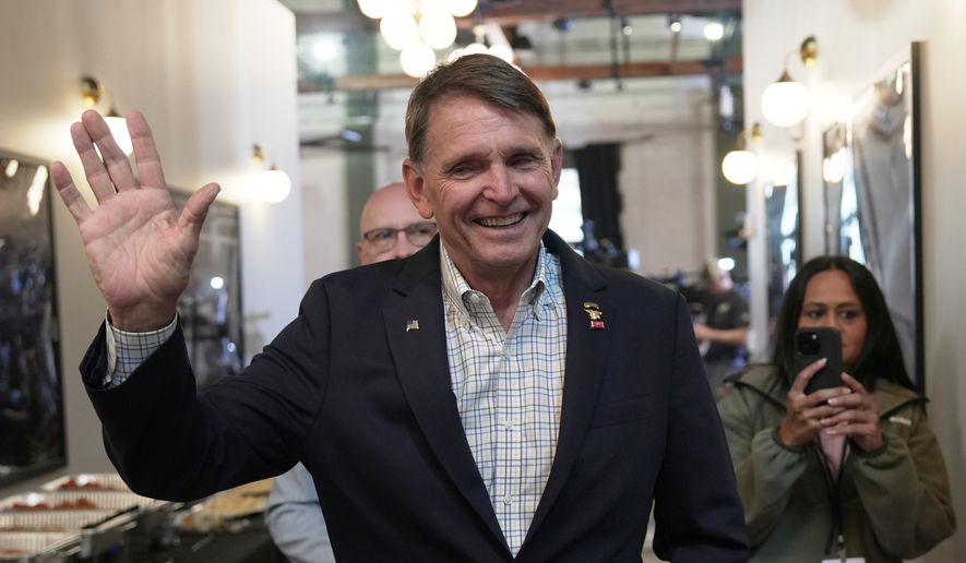 Republican congressional candidate Ed Gallrein greets supporters during an election night event Tuesday, May 19, 2026, in Covington, Ky. (AP Photo/Joshua A. Bickel)