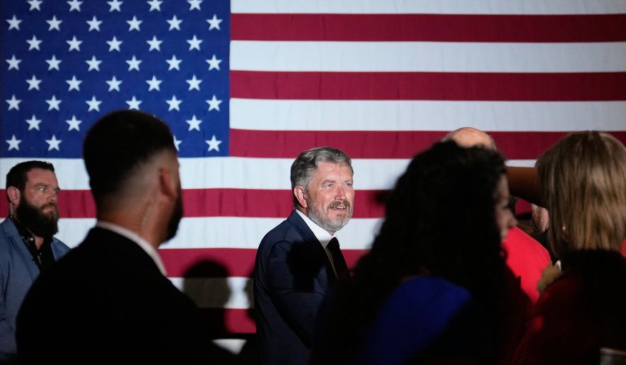 Rep. Thomas Massie, R-Ky., speaks with attendees during an election night watch party after losing the Republican party's nomination at the Marriott Cincinnati Airport, Tuesday, May 19, 2026, in Hebron, Ky. (AP Photo/Carolyn Kaster)