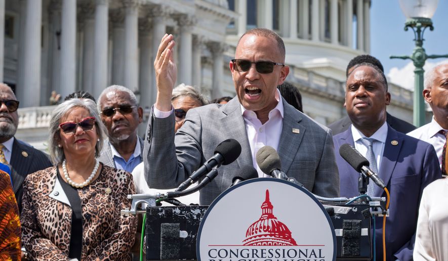 House Minority Leader Hakeem Jeffries, D-N.Y., and members of the Congressional Black Caucus speak outside the Capitol in Washington, Tuesday, May 19, 2026. (AP Photo/J. Scott Applewhite)