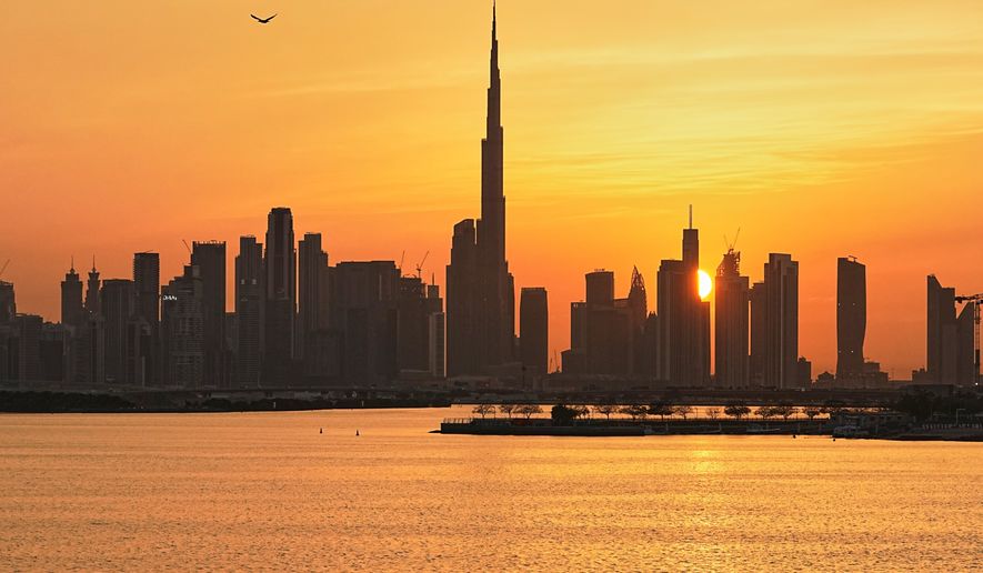 FILE - The skyline of Dubai, United Arab Emirates, March 11, 2026, with the Burj Khalifa at center. (AP Photo/Fatima Shbair, File)
