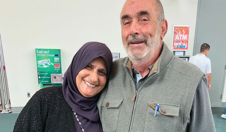 This undated photo provided by Yasser Kaziha shows his father, Mansour Kaziha, right, who died in the Monday, May 18, 2026 shooting at a San Diego mosque, and his mother, Sabah Kaziha. (Yasser Kaziha via AP)