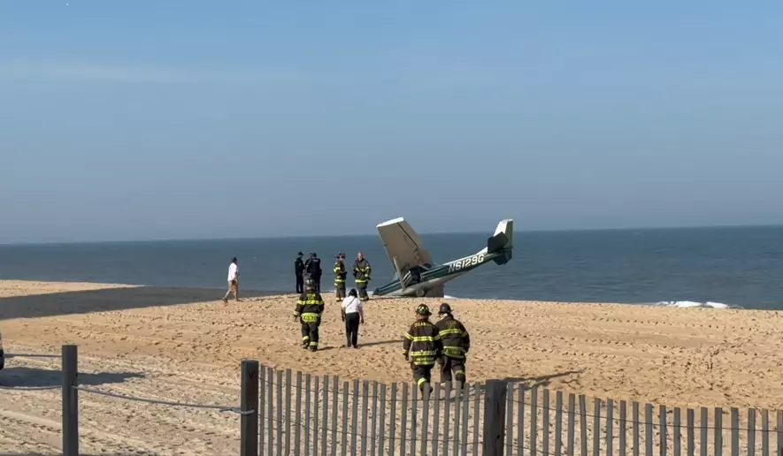 Ocean City Fire Department and Ocean City Police Department responded to a Cessna's emergency landing on the beach at Ocean City, Md., on May 18, 2026. (Screenshot from video posted by the Ocean City Fire Department. https://www.facebook.com/OCMDFD/)