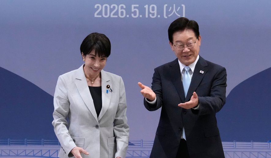 Japan's Prime Minister Sanae Takaichi, left, and South Korea's President Lee Jae-myung react during their meeting in Andong, South Korea, Tuesday, May 19, 2026. (AP Photo/Ahn Young-joon, Pool)