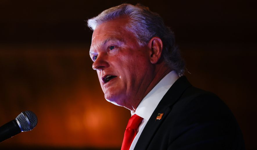 U.S. Rep. Mike Collins, R-Ga., speaks at his primary election watch party in Jackson, Ga. on Tuesday, May 19, 2026. (Arvin Temkar/Atlanta Journal-Constitution via AP)