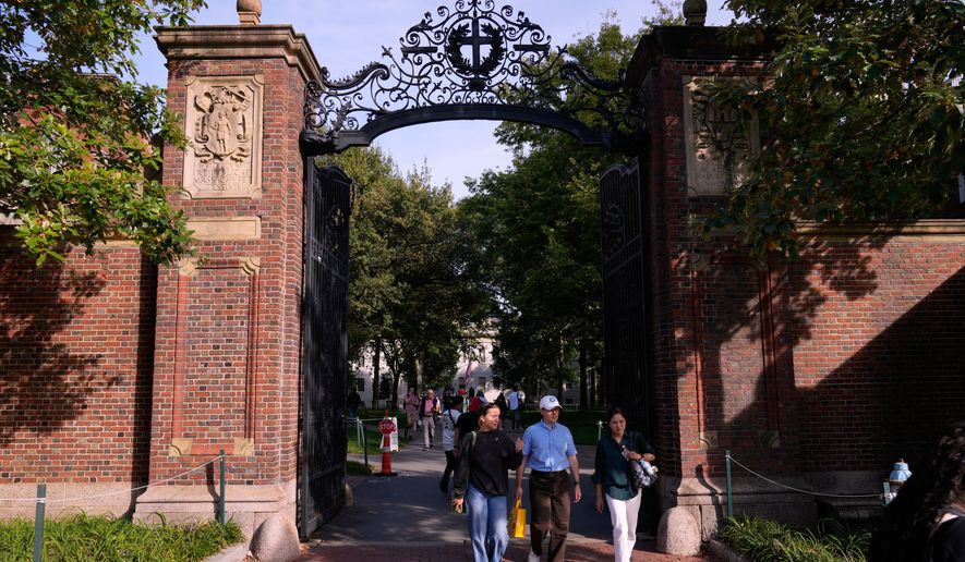 The gates of Harvard Yard at Harvard University, Sept. 30, 2025, in Cambridge, Mass. (AP Photo/Charles Krupa, File)