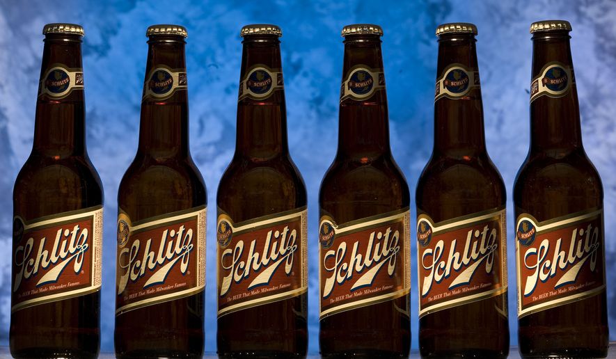 Some of the new bottles of Schlitz beer are seen Thursday, July 24, 2008, in Milwaukee. (AP Photo/Morry Gash) **FILE**