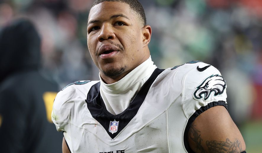 FILE - Philadelphia Eagles linebacker Nolan Smith Jr. (3) looks on after an NFL football game against the Washington Commanders, Saturday, Dec. 20, 2025, in Landover, Md. (AP Photo/Daniel Kucin Jr., File)