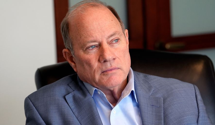FILE - Detroit Mayor Mike Duggan is interviewed, Dec. 3, 2024, in Detroit. (AP Photo/Carlos Osorio, File)