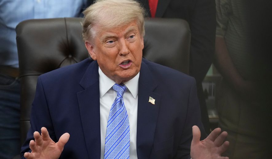 President Donald Trump speaks during an event about loosening a federal refrigerant rule, in the Oval Office at the White House, Thursday, May 21, 2026, in Washington. (AP Photo/Jacquelyn Martin)