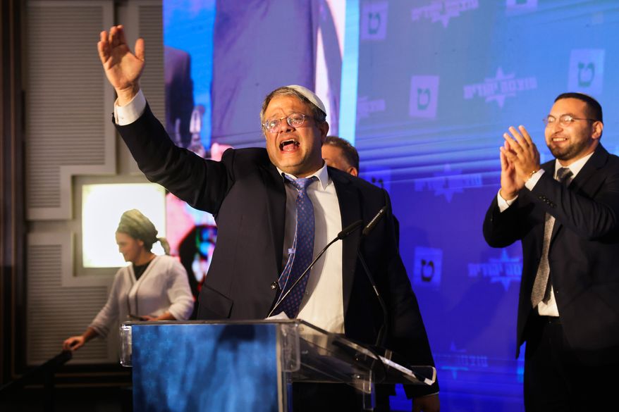 Israeli far-right lawmaker Itamar Ben-Gvir gestures after election exit poll results are released at his party's headquarters in Jerusalem on Nov. 2, 2022. (AP Photo/Oren Ziv, File)