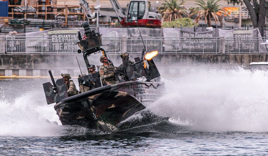 Members of U.S. Special Operations Forces and 10 partner nations conduct a capabilities demonstration along the Tampa Bay waterfront during SOF Week 2026 in Tampa Bay, Florida, May 20, 2026. U.S. Special Operations Forces, in collaboration with 10 partner nations, conducted a dynamic capabilities demonstration along the Tampa Bay waterfront that featured the future of special operations technology and tactical innovation. (U.S. Army photo by Staff Sgt. Ashley Low)