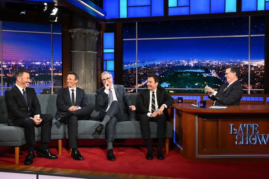 This image released by CBS shows host Stephen Colbert, right, with guests, from left, Jimmy Kimmel, Seth Meyers, John Oliver and Jimmy Fallon on "The Late Show with Stephen Colbert" in New York on May 11, 2026. (Scott Kowalchyk/CBS via AP) Correction: Corrects ID order.