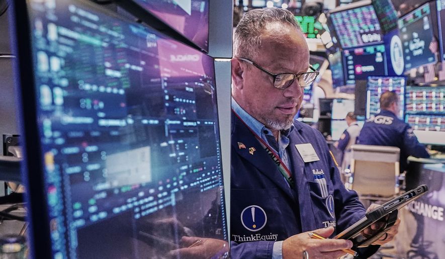 Trader Robert Arciero works on the floor of the New York Stock Exchange, Friday, May 22, 2026. (AP Photo/Richard Drew)