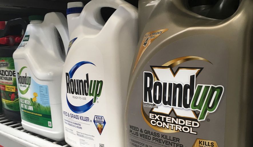 FILE - Containers of Roundup are displayed on a store shelf on Feb. 24, 2019, in San Francisco. (AP Photo/Haven Daley, File)
