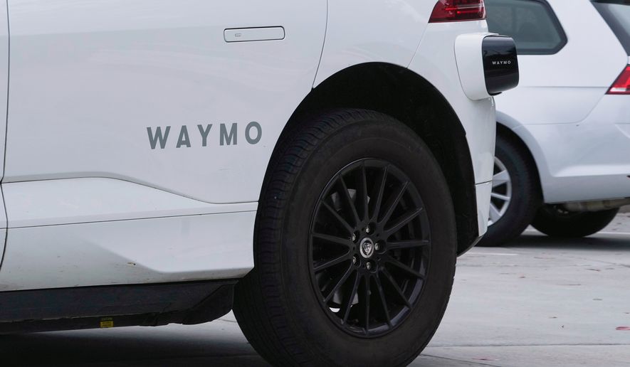 A Waymo vehicle drives in San Francisco on July 3, 2025. (AP Photo/Jeff Chiu) **FILE**