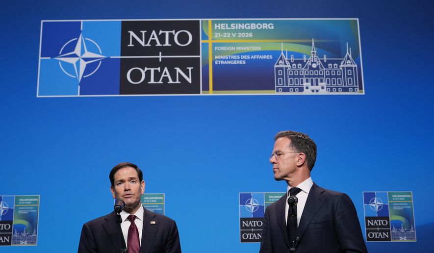 United States Secretary of State Marco Rubio, left, and NATO Secretary General Mark Rutte look at each other as they deliver a statement during a meeting of NATO foreign ministers in Helsingborg, Sweden, Friday, May 22, 2026. (AP Photo/Julia Demaree Nikhinson, Pool)