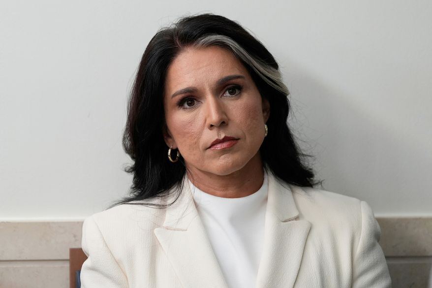 Director of National Intelligence Tulsi Gabbard sits in the James Brady Press Briefing Room at the White House, July 23, 2025, in Washington. (AP Photo/Alex Brandon, File)