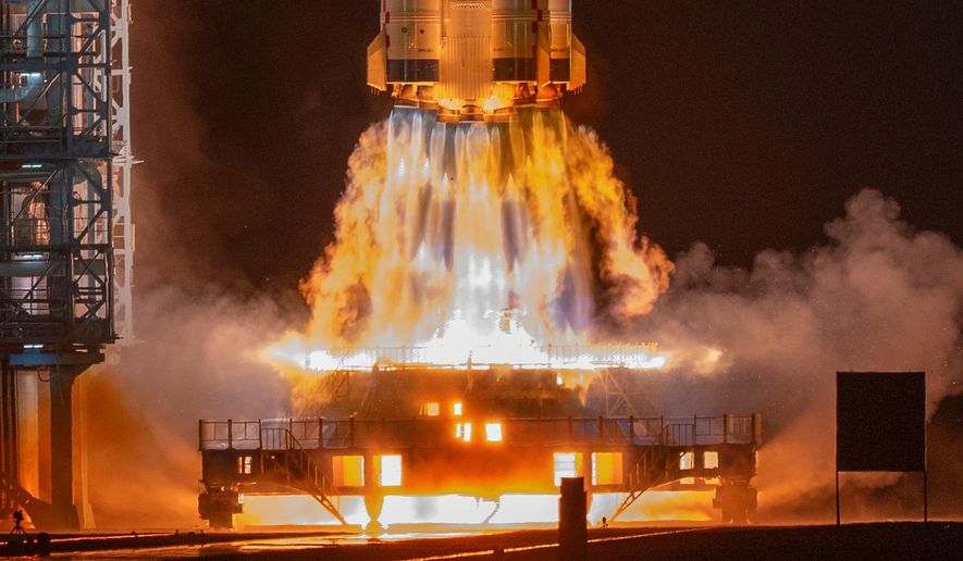 The Shenzhou-23 manned mission launches from the Jiuquan Satellite Launch Center in Jiuquan, northwestern China on Sunday, May 24, 2026. (AP Photo/Ng Han Guan)