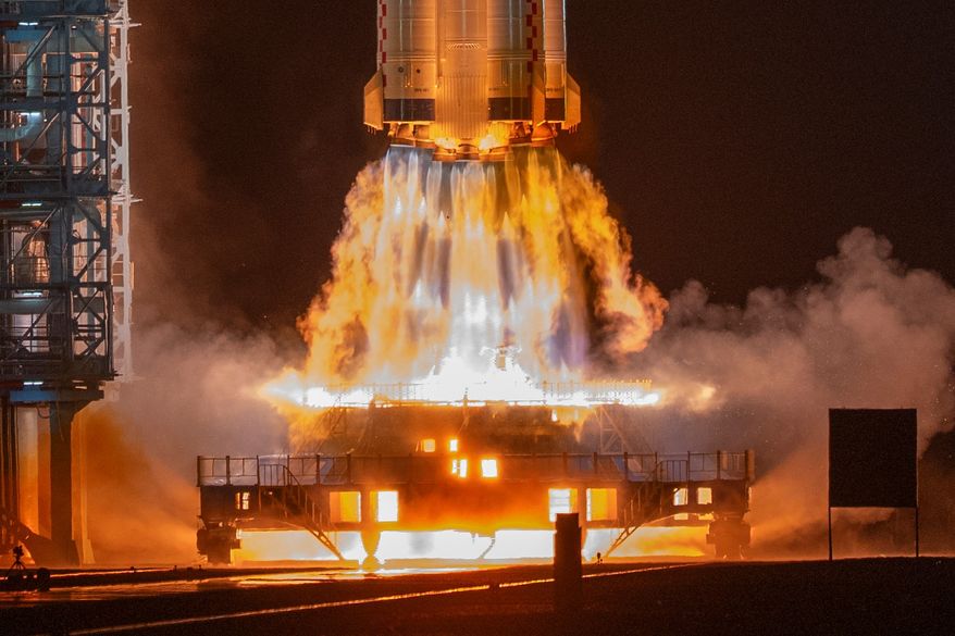 The Shenzhou-23 manned mission launches from the Jiuquan Satellite Launch Center in Jiuquan, northwestern China on Sunday, May 24, 2026. (AP Photo/Ng Han Guan)