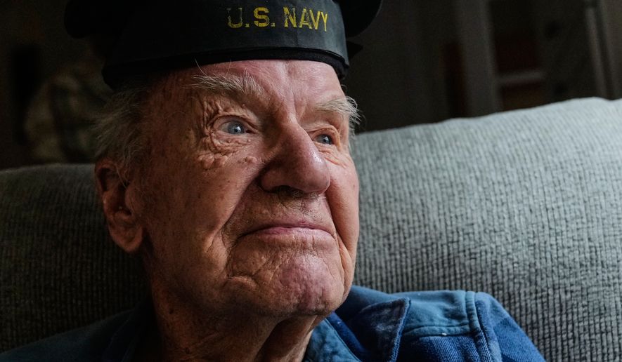 Freeman K. Johnson, a 106-year-old Pearl Harbor survivor, listens to a question during an interview at his home, May 6, 2026, in Centerville, Mass. (AP Photo/Charles Krupa)