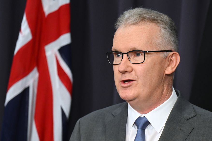 Australian Home Affairs Minister Tony Burke speaks to the media during a press conference at Parliament House in Canberra, Australia, Wednesday, March 11, 2026. (Lukas Coch/AAPImage via AP, File)