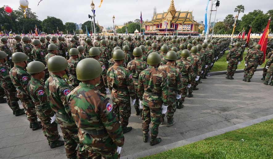 Cambodian military members participate together with government civil servants in the country's 70th Independence Day, in Phnom Penh, Cambodia, Thursday, Nov. 9, 2023. (AP Photo/Heng Sinith, file)