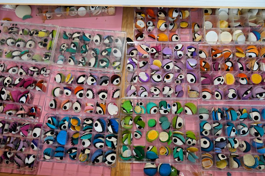Trays full of eyes, used to make puppets, are seen at Jim Henson's Creature Shop in New York, Wednesday, May 13, 2026. (AP Photo/Seth Wenig)
