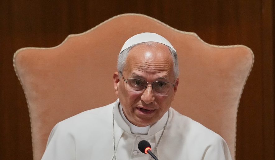 Pope Leo XIV speaks during the presentation of his first encyclical, "Magnifica humanitas: On Safeguarding the Human Person in the Time of Artificial Intelligence," at the Vatican, Monday, May 25, 2026. (AP Photo/Alessandra Tarantino)