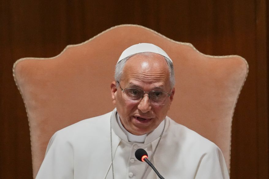 Pope Leo XIV speaks during the presentation of his first encyclical, "Magnifica humanitas: On Safeguarding the Human Person in the Time of Artificial Intelligence," at the Vatican, Monday, May 25, 2026. (AP Photo/Alessandra Tarantino)