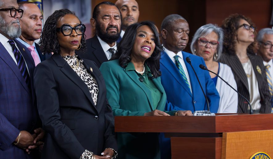 Rep. Terri Sewell, D-Ala., center, is surrounded by members of the Congressional Black Caucus as they speak to reporters at the Capitol in Washington on Wednesday, April 29, 2026, in the wake of the Supreme Court ruling to strike down a majority Black congressional district in Louisiana. (AP Photo/J. Scott Applewhite) **FILE**