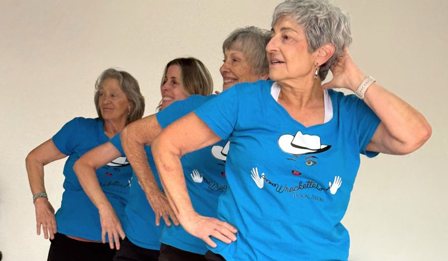Gail Kowalski, from left, Suzy Rhoades, Carol Ross and Cindy Soffrin, of The Rodeo City Wreckettes, a tap and jazz dance group for older women, practice on Thursday, April 16, 2026, in Tucson, Ariz. (Anita Snow via AP)