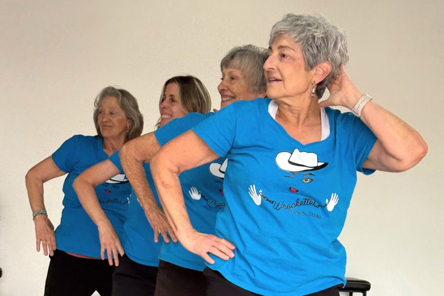 Gail Kowalski, from left, Suzy Rhoades, Carol Ross and Cindy Soffrin, of The Rodeo City Wreckettes, a tap and jazz dance group for older women, practice on Thursday, April 16, 2026, in Tucson, Ariz. (Anita Snow via AP)
