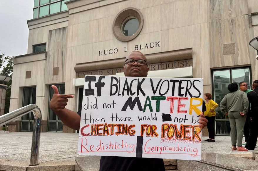 Travis Jackson stands outside the federal courthouse on Friday, May 22, 2026, in Birmingham, Ala. after a court hearing related to redistricting litigation. (AP Photo/Kim Chandler)