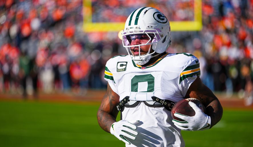 FILE - Green Bay Packers running back Josh Jacobs warms up before an NFL football game against the Denver Broncos, Dec. 14, 2025, in Denver. (AP Photo/Jack Dempsey, File)