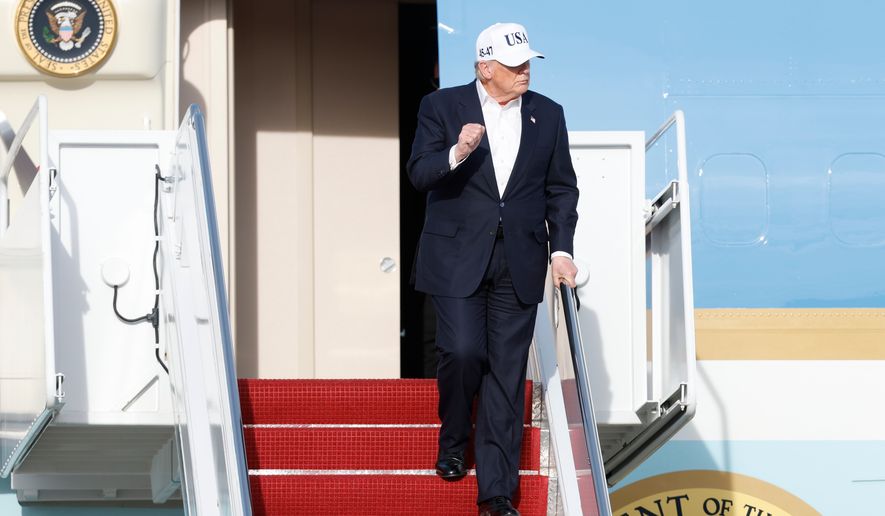 President Donald Trump walks down the stairs of Air Force One upon his arrival at Joint Base Andrews, Md., Friday, Nov. 15, 2026. (AP Photo/Luis M. Alvarez)